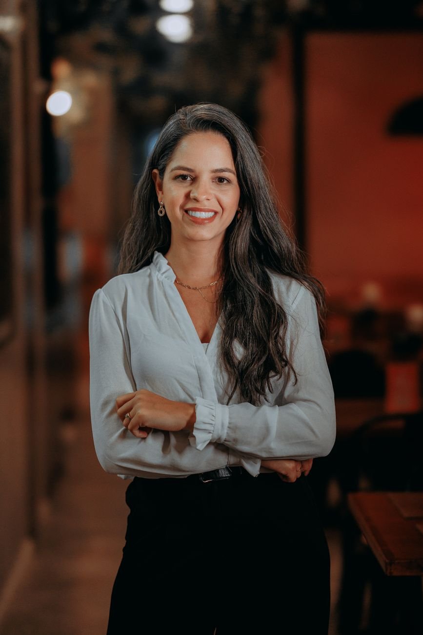 Confident business owner, satisfied OptiPresence client